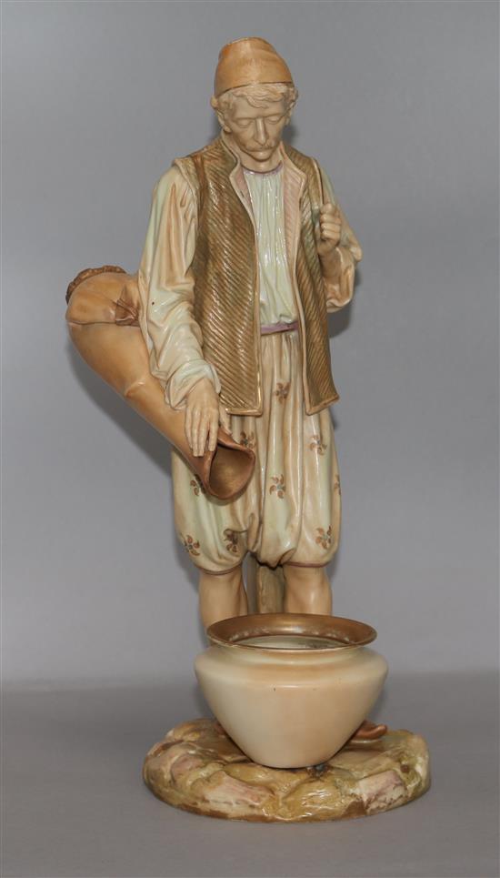 A large Royal Worcester figure of an Arab water carrier